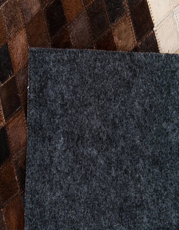 Detail image of  5' x 7' 10 Cowhide Stocks Rug
