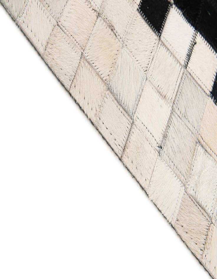 Detail image of  5' x 7' 10 Cowhide Stocks Rug