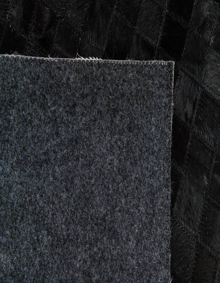 Detail image of  5' x 7' 10 Cowhide Stocks Rug