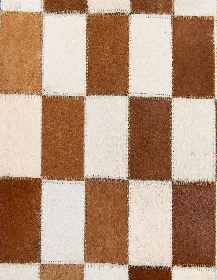 Detail image of  5' x 7' 11 Cowhide Stocks Rug
