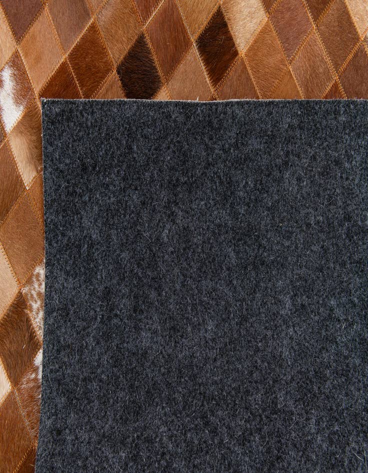 Detail image of  4' 10 x 7' 9 Cowhide Stocks Rug