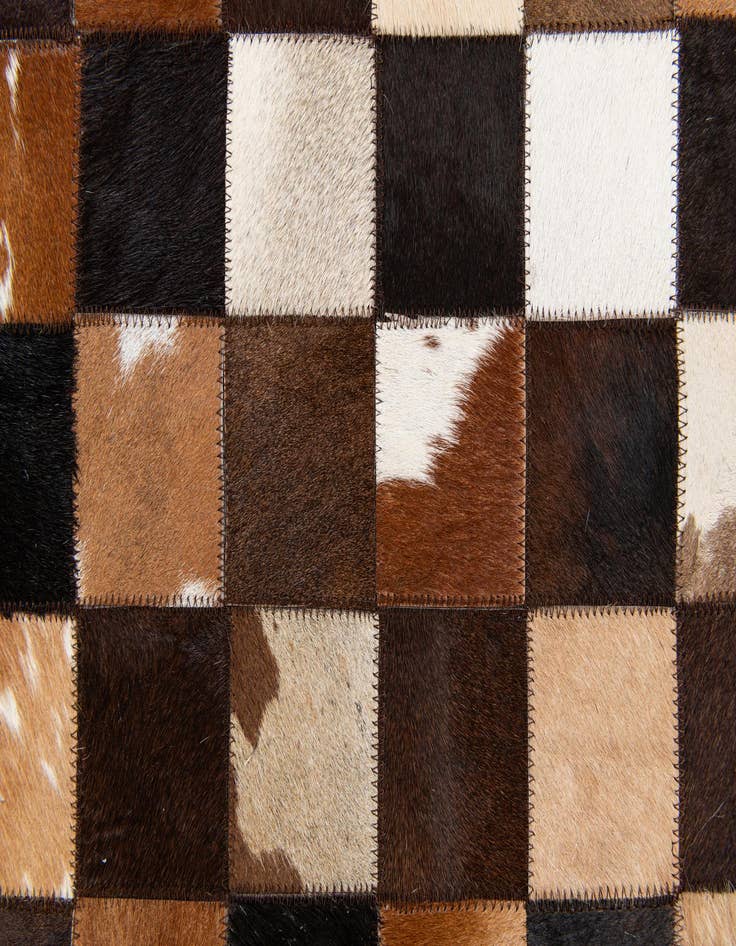 Detail image of  5' x 7' 11 Cowhide Stocks Rug