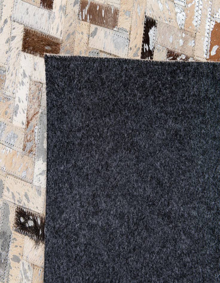 Detail image of  5' 2 x 7' 6 Cowhide Stocks Rug