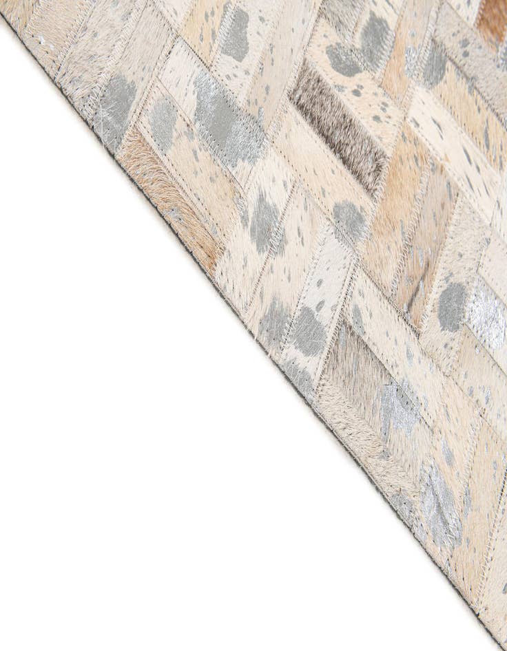 Detail image of  4' 11 x 8' 1 Cowhide Stocks Rug