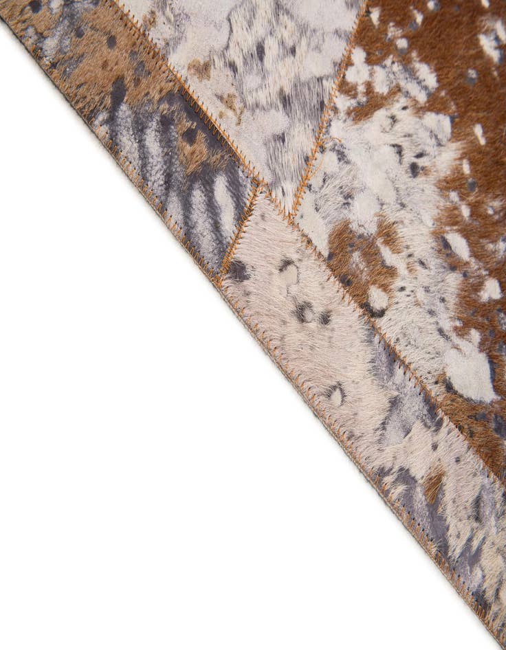 Detail image of  5' 2 x 8' Cowhide Stocks Rug