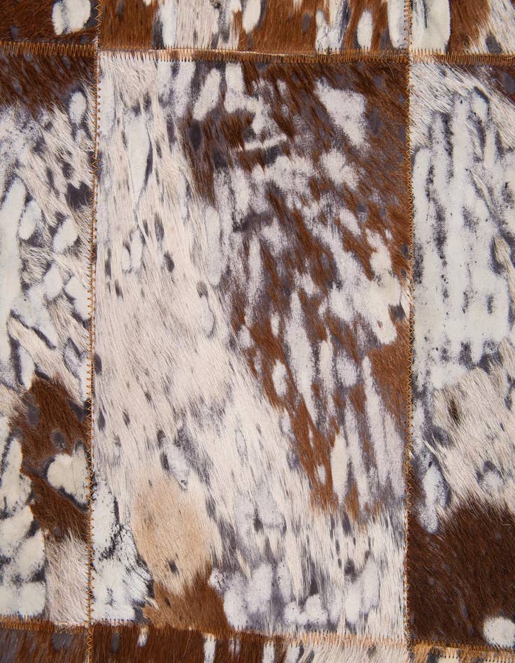 Detail image of  5' 2 x 8' Cowhide Stocks Rug