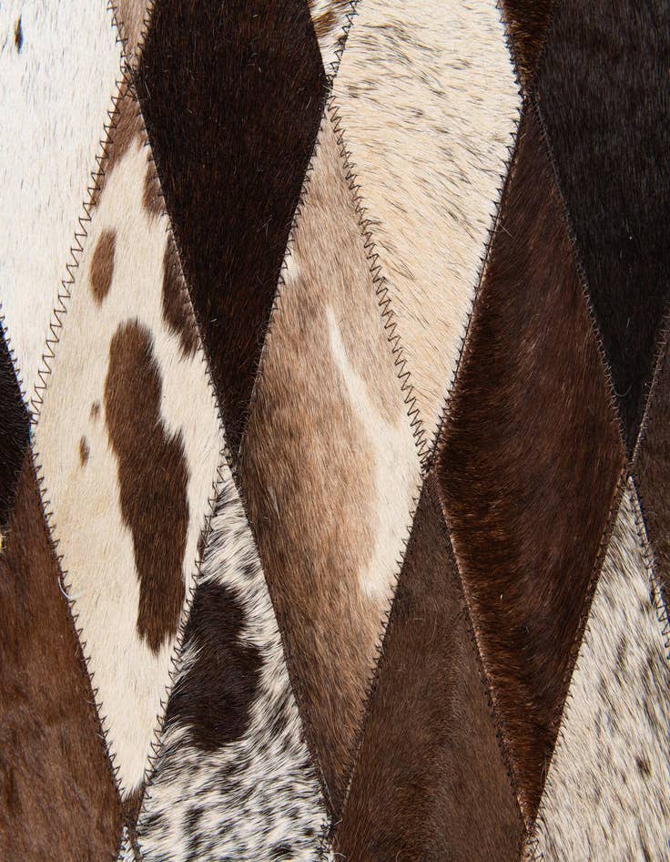 Detail image of  6' 9 x 9' 9 Cowhide Stocks Rug