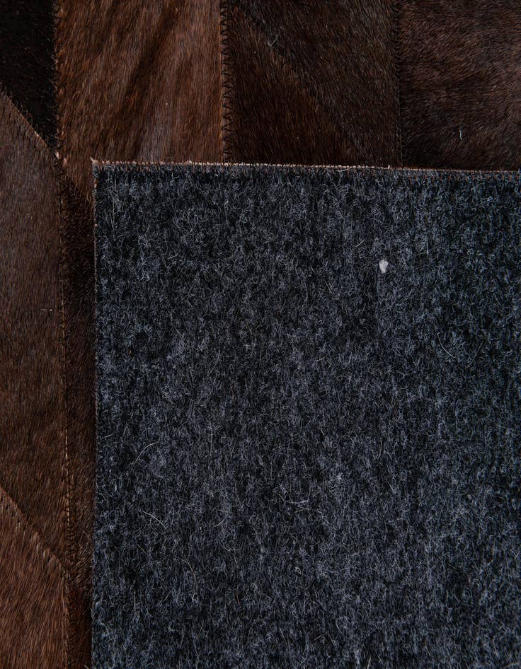 Detail image of  4' 8 x 6' 7 Cowhide Stocks Rug