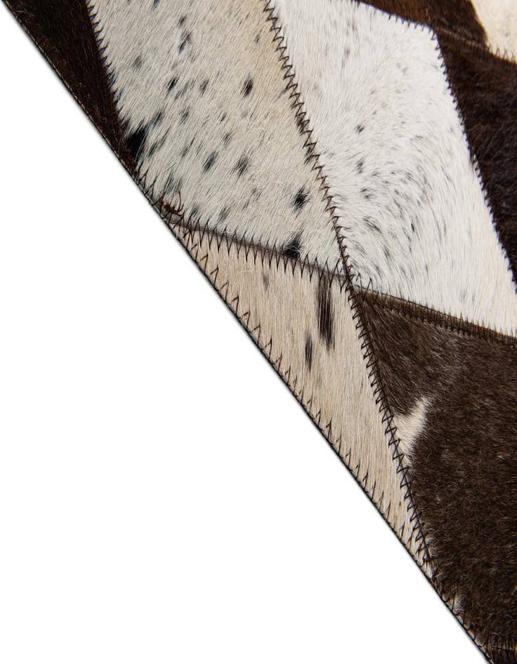 Detail image of  4' 8 x 6' 9 Cowhide Stocks Rug