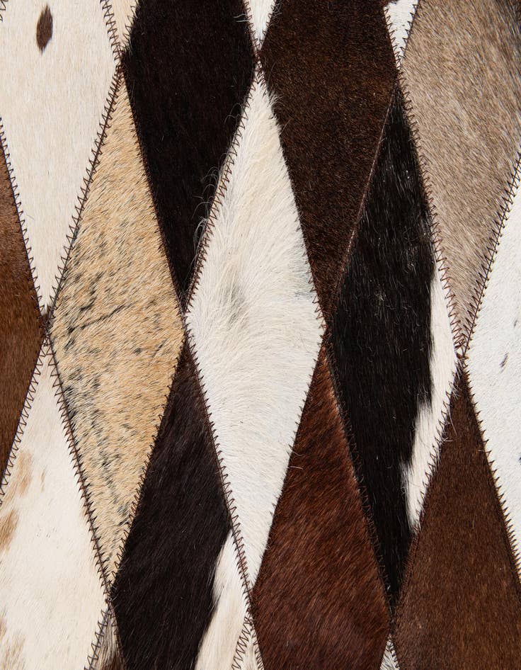 Detail image of  4' 8 x 6' 9 Cowhide Stocks Rug