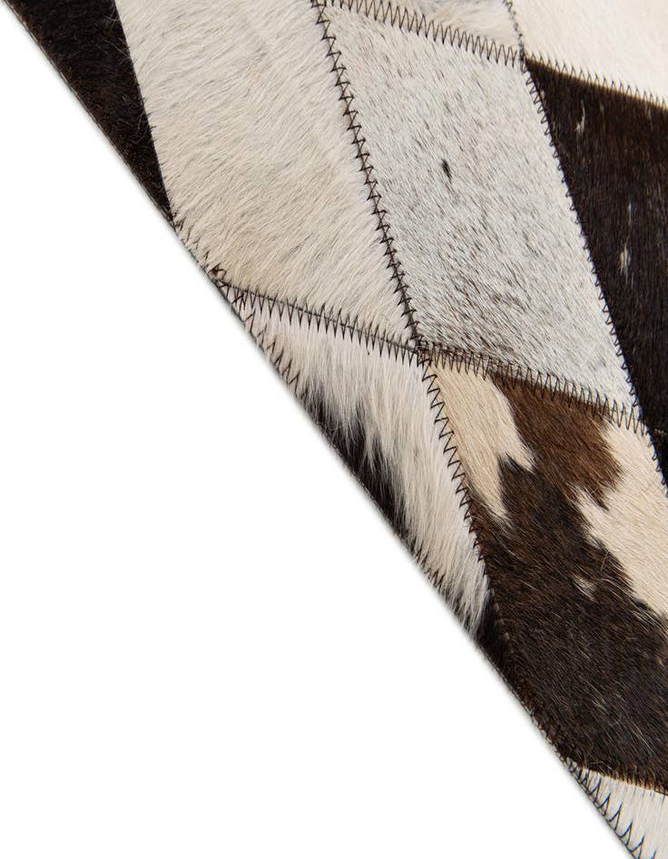 Detail image of  4' 8 x 6' 9 Cowhide Stocks Rug