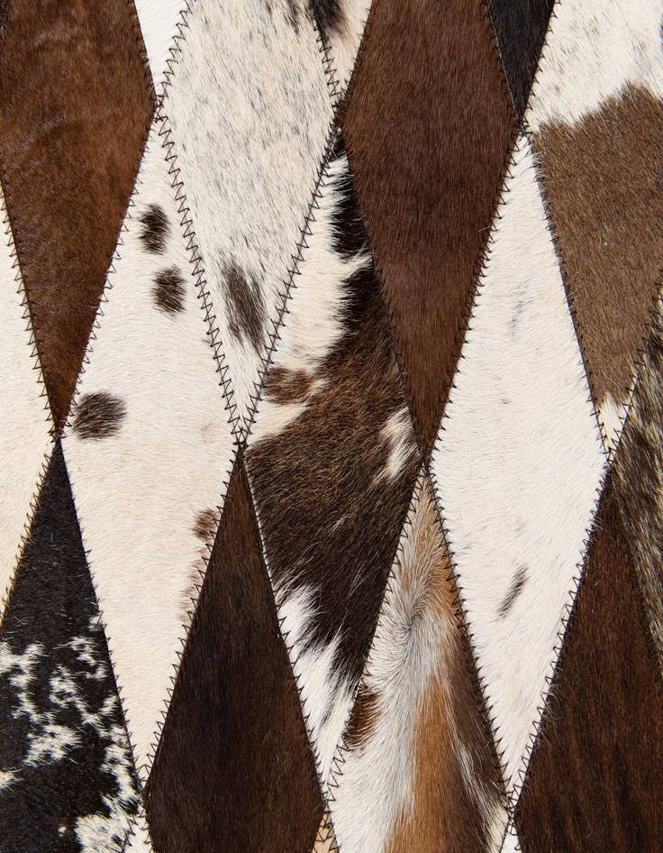 Detail image of  4' 8 x 6' 9 Cowhide Stocks Rug