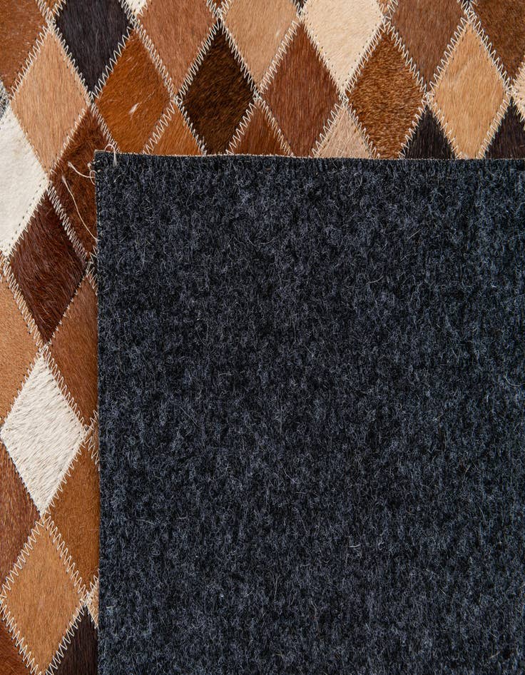 Detail image of  4' 8 x 6' 8 Cowhide Stocks Rug