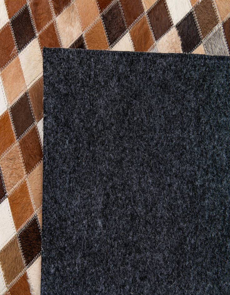 Detail image of  4' 8 x 6' 8 Cowhide Stocks Rug