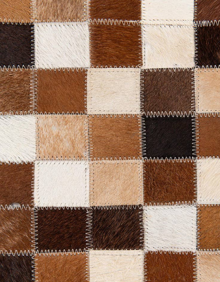 Detail image of  4' 7 x 6' 7 Cowhide Stocks Rug