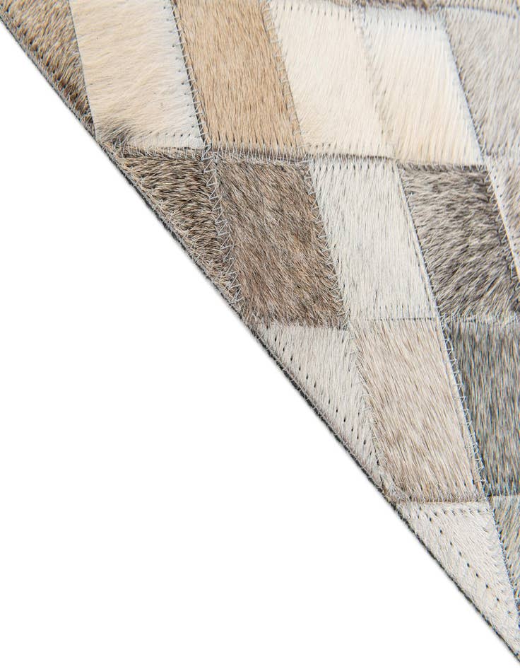 Detail image of  4' 7 x 6' 7 Cowhide Stocks Rug
