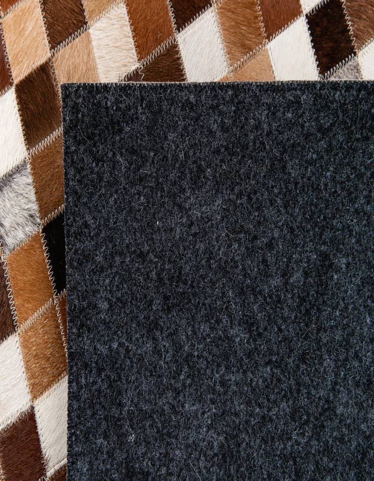 Detail image of  4' x 5' 11 Cowhide Stocks Rug