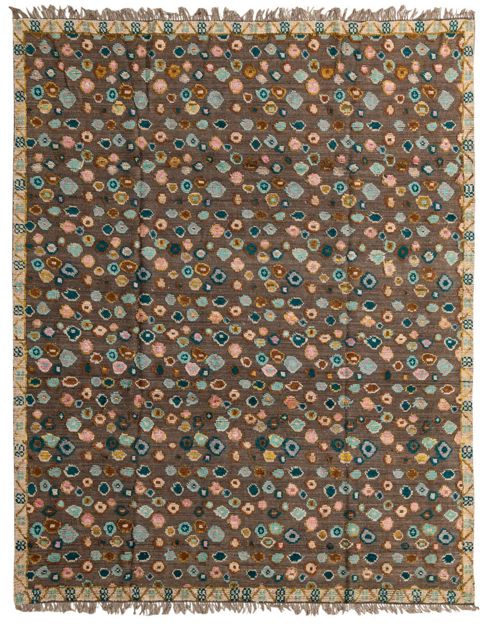 A rectangular 8x10 Darya wool rug featuring a modern abstract pattern of colorful shapes on a brown background, with a decorative border and fringe.