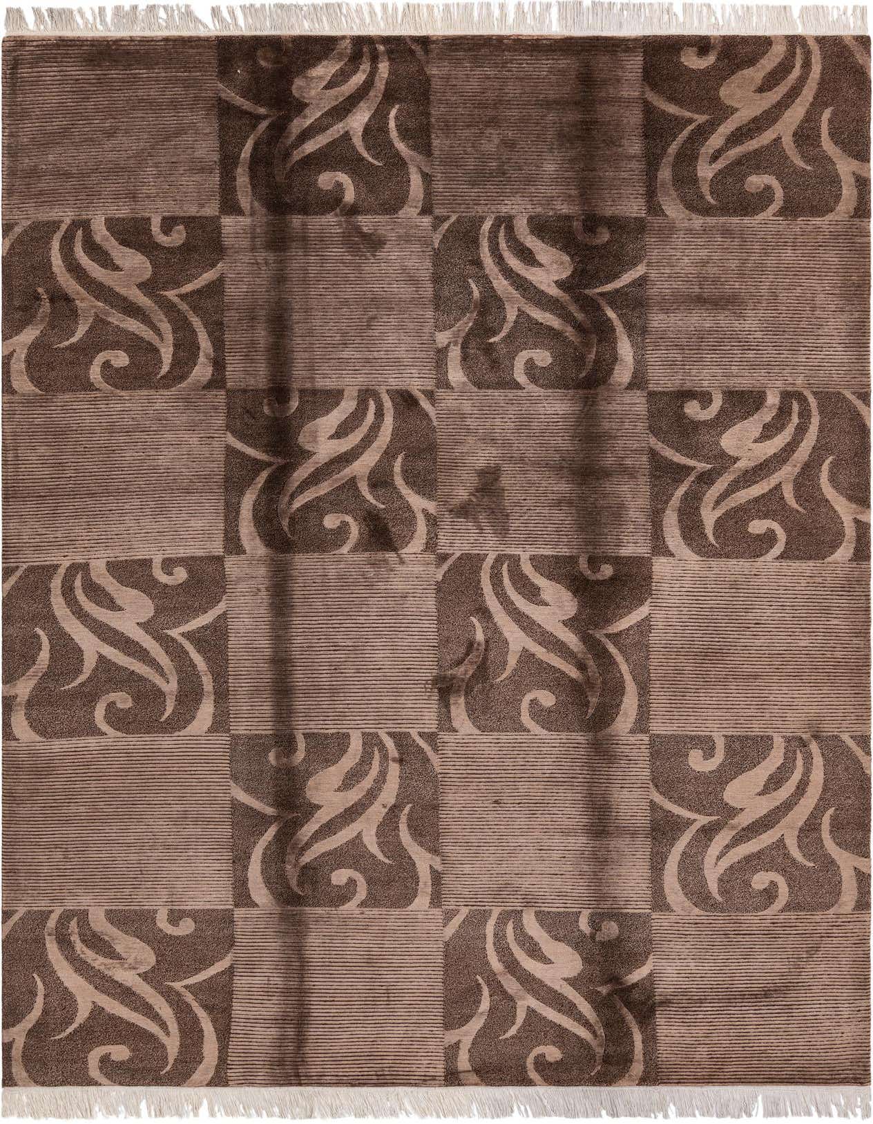 A 7x10 rectangular Darya Collection wool rug featuring a modern oriental pattern of alternating dark brown abstract swirls and tan striped blocks, with white fringe.