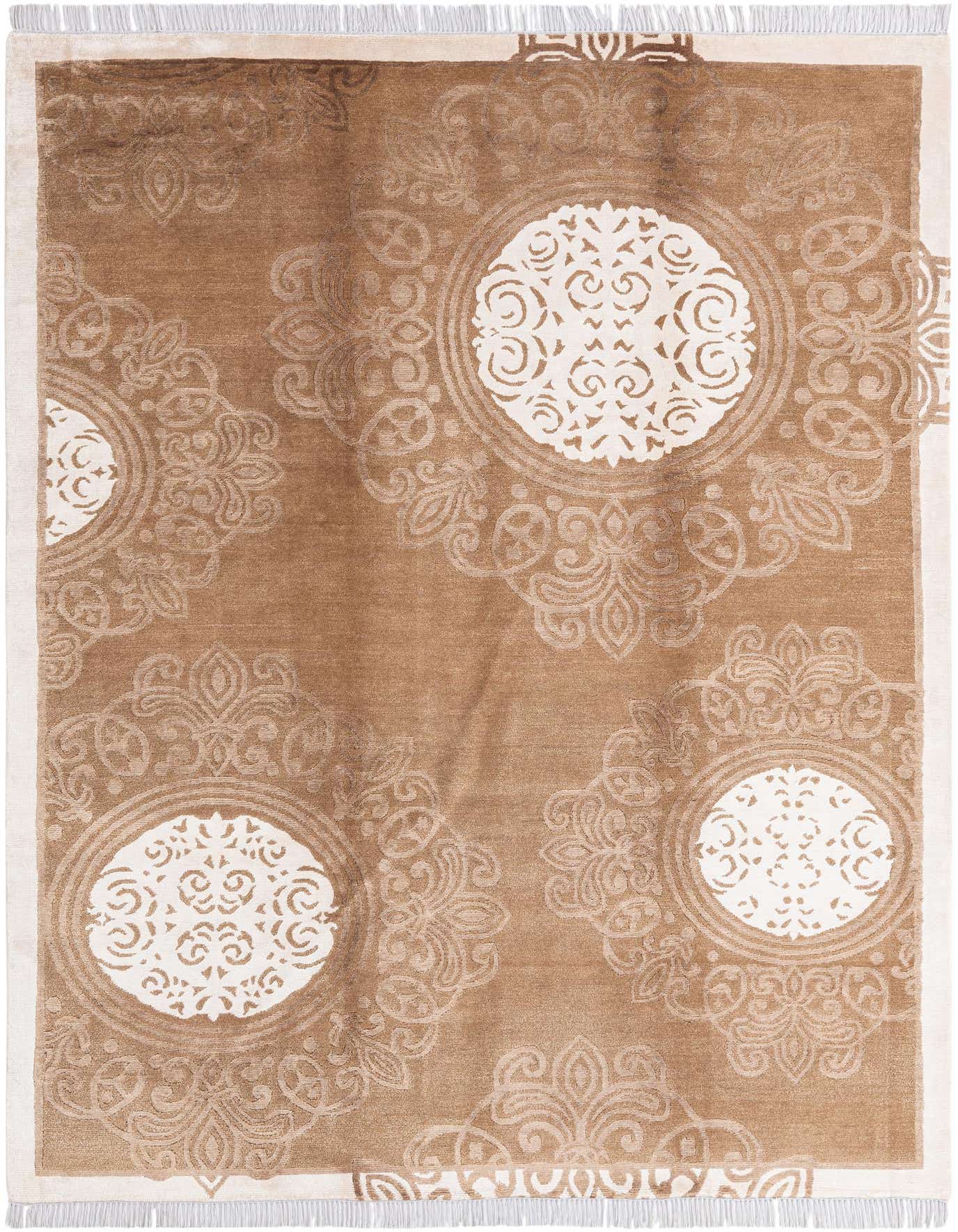 A 5x8 rectangular brown wool rug with a modern oriental pattern featuring large white medallions and intricate tan designs.