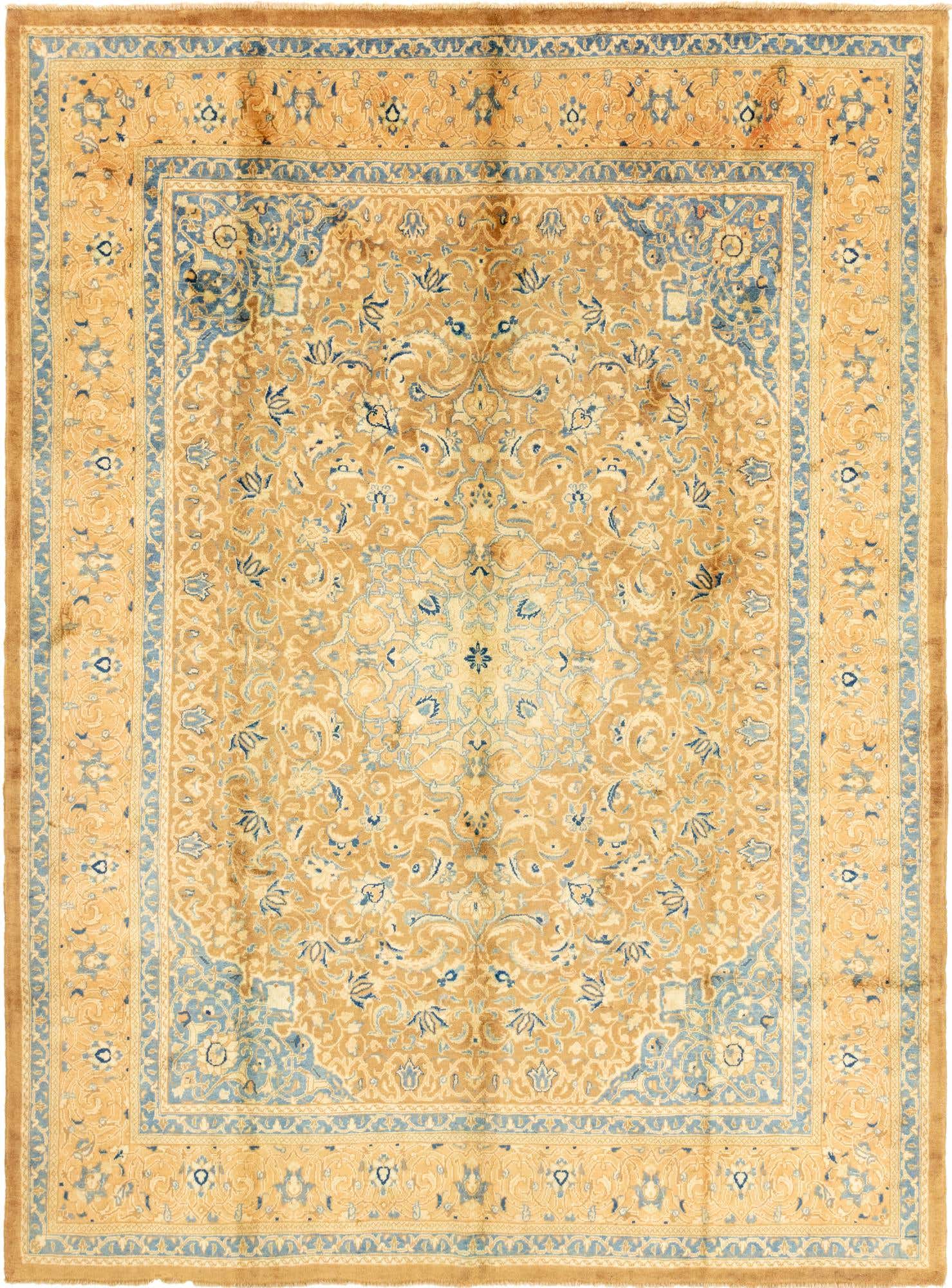 A 10x13 rectangular Farahan rug in warm brown and tan, featuring a traditional Persian medallion pattern with intricate floral motifs and a blue border.