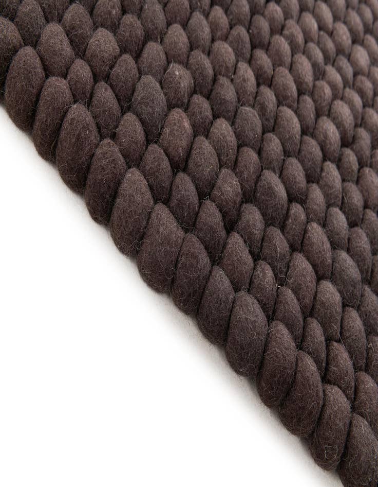 Detail image of  2' 2 x 3' 3  Hand Woven Felt Ball Wool Rug