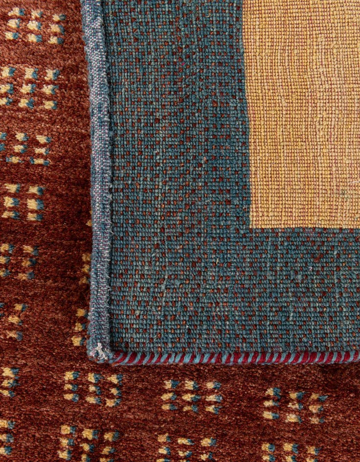 Detail image of  4' 2 x 5' 11  Hand Knotted Gabbeh Wool Rug