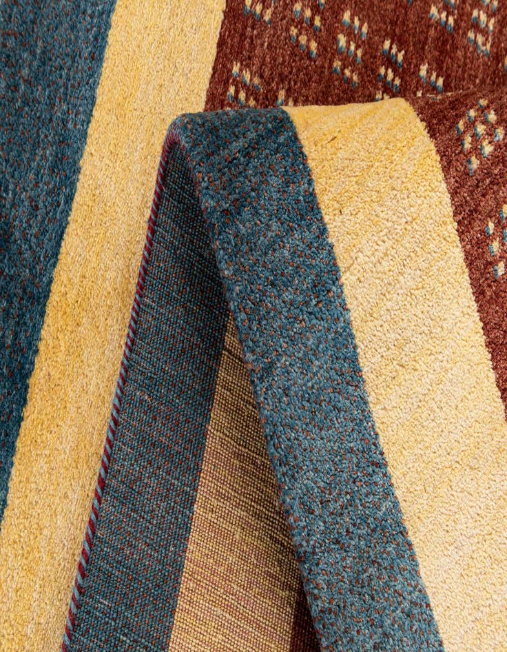 Detail image of  4' 2 x 5' 11  Hand Knotted Gabbeh Wool Rug