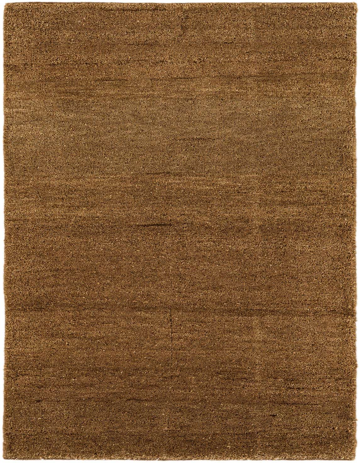 A rectangular, medium pile, handmade Gabbeh rug in varying shades of brown and tan, showcasing a modern, solid color design.