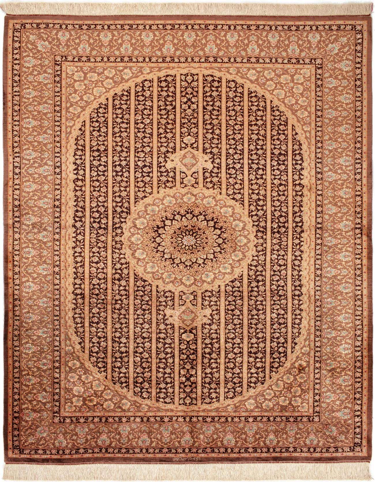 A 4x6 rectangular Ghom Silk Persian rug in browns and tans, featuring an intricate floral medallion and striped pattern.