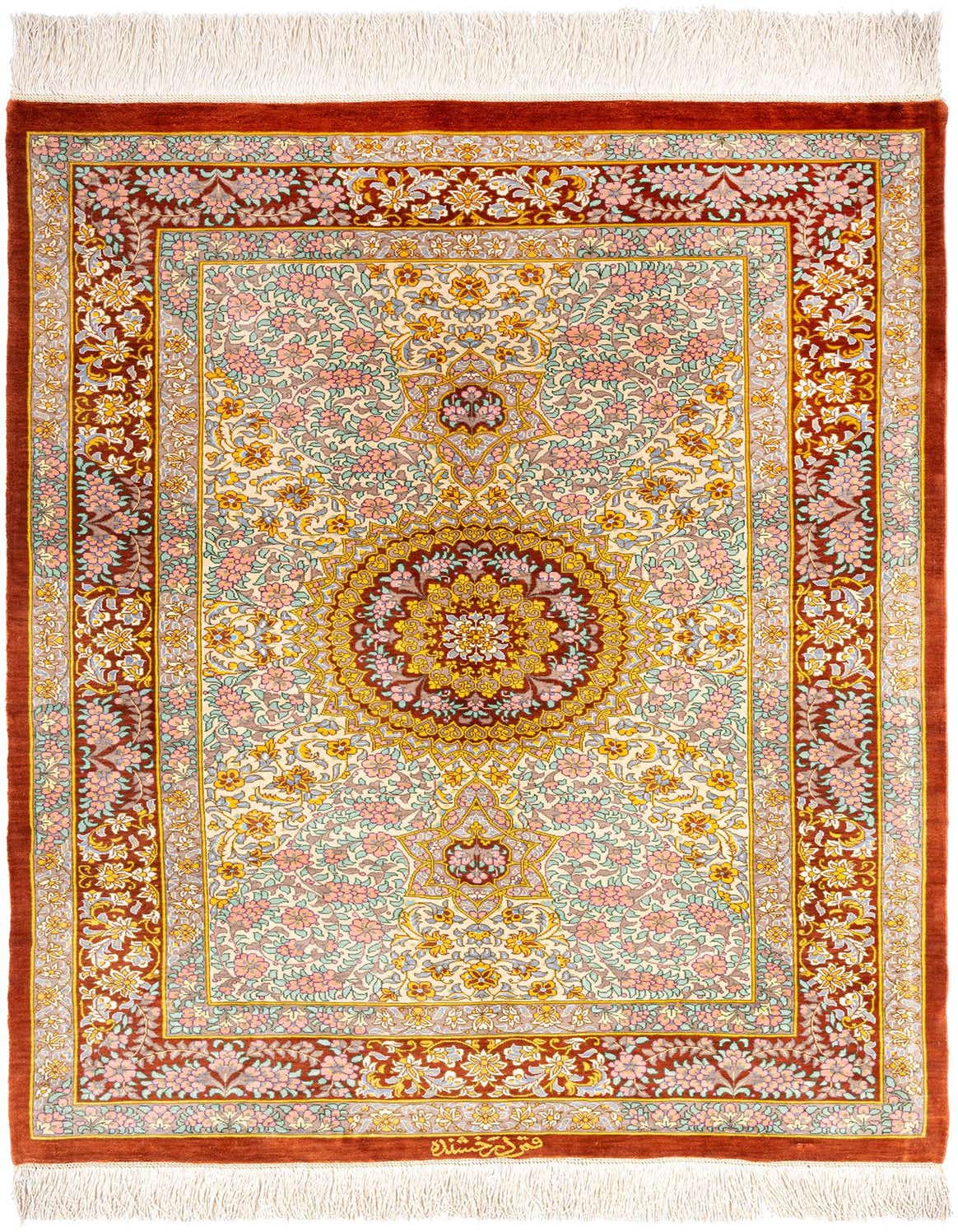 A 3x4 rectangular Ghom Silk Persian rug featuring a central medallion and intricate floral patterns in shades of brown, tan, pink, and light blue, with white fringe.