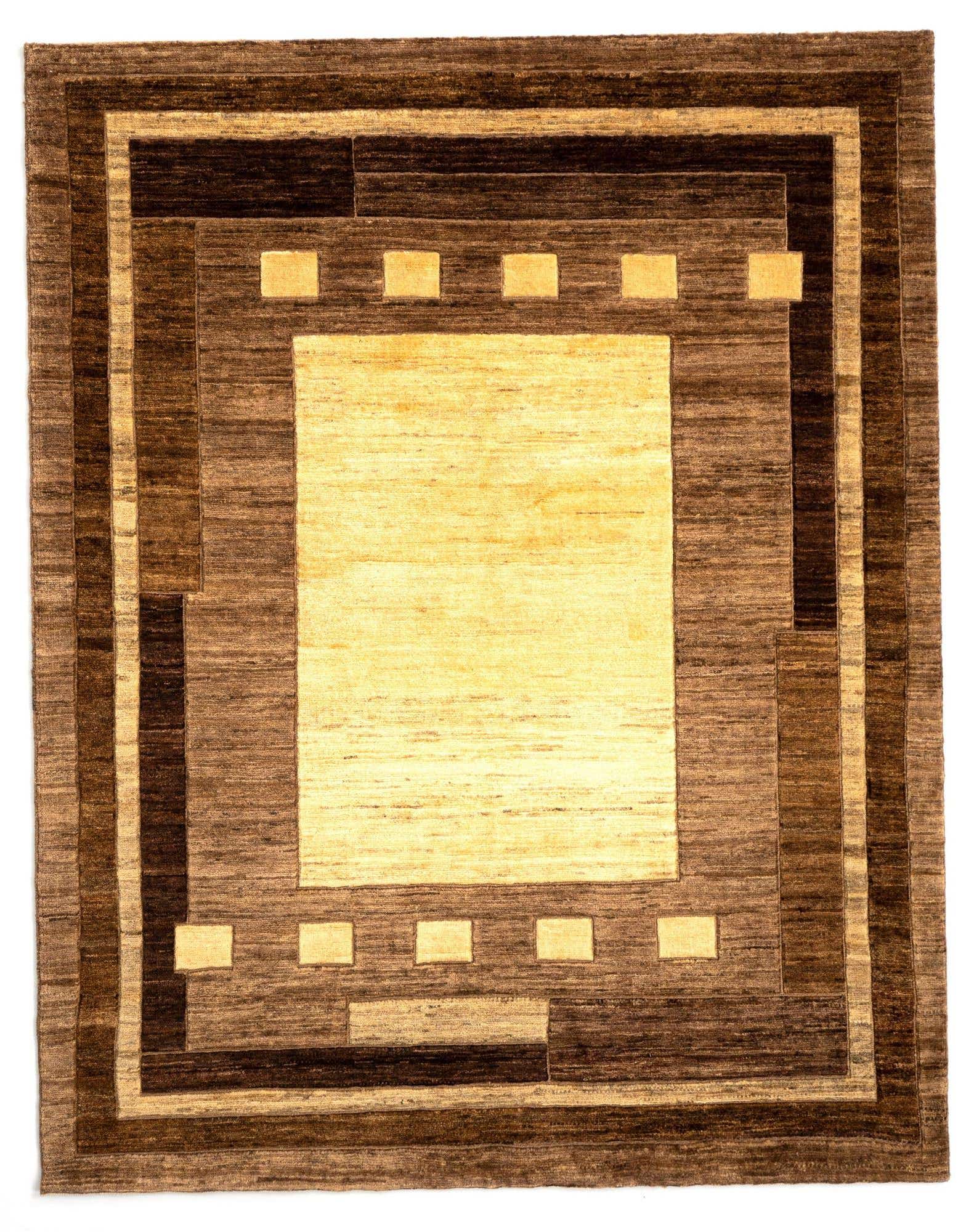 A 4x6 rectangular Juma rug featuring a light tan center with a thick border in varying shades of brown and tan, accented with small tan squares.