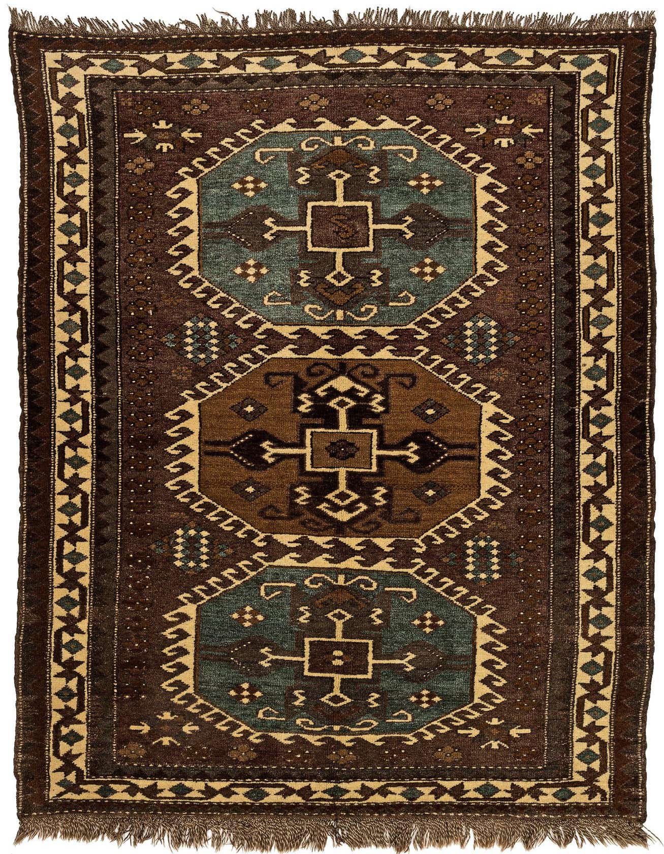 A 4x6 rectangular Kars rug featuring a tribal medallion pattern in rich browns, tans, and teal accents, with fringed ends.