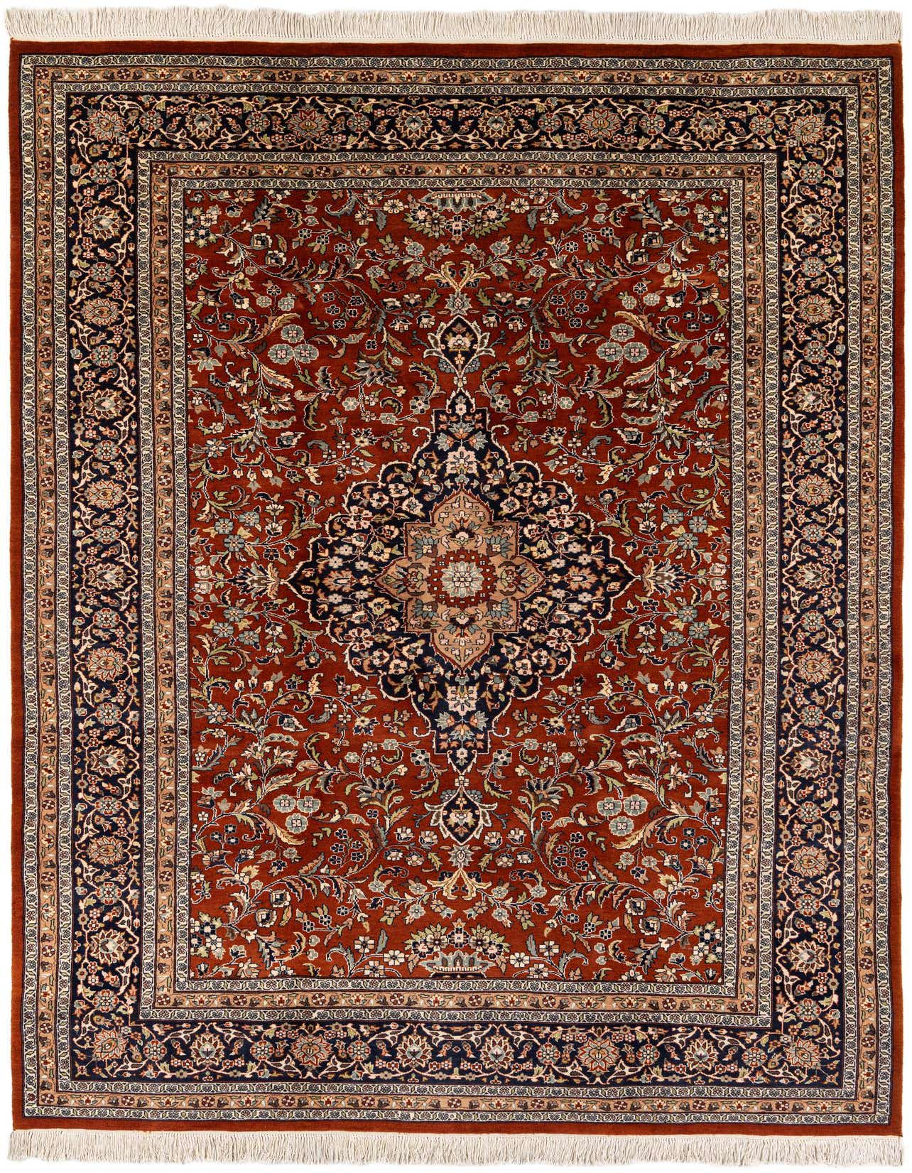 A 7x10 rectangular Kashmir rug in rich browns and tans, featuring an intricate traditional Oriental medallion pattern with floral motifs and a detailed border.