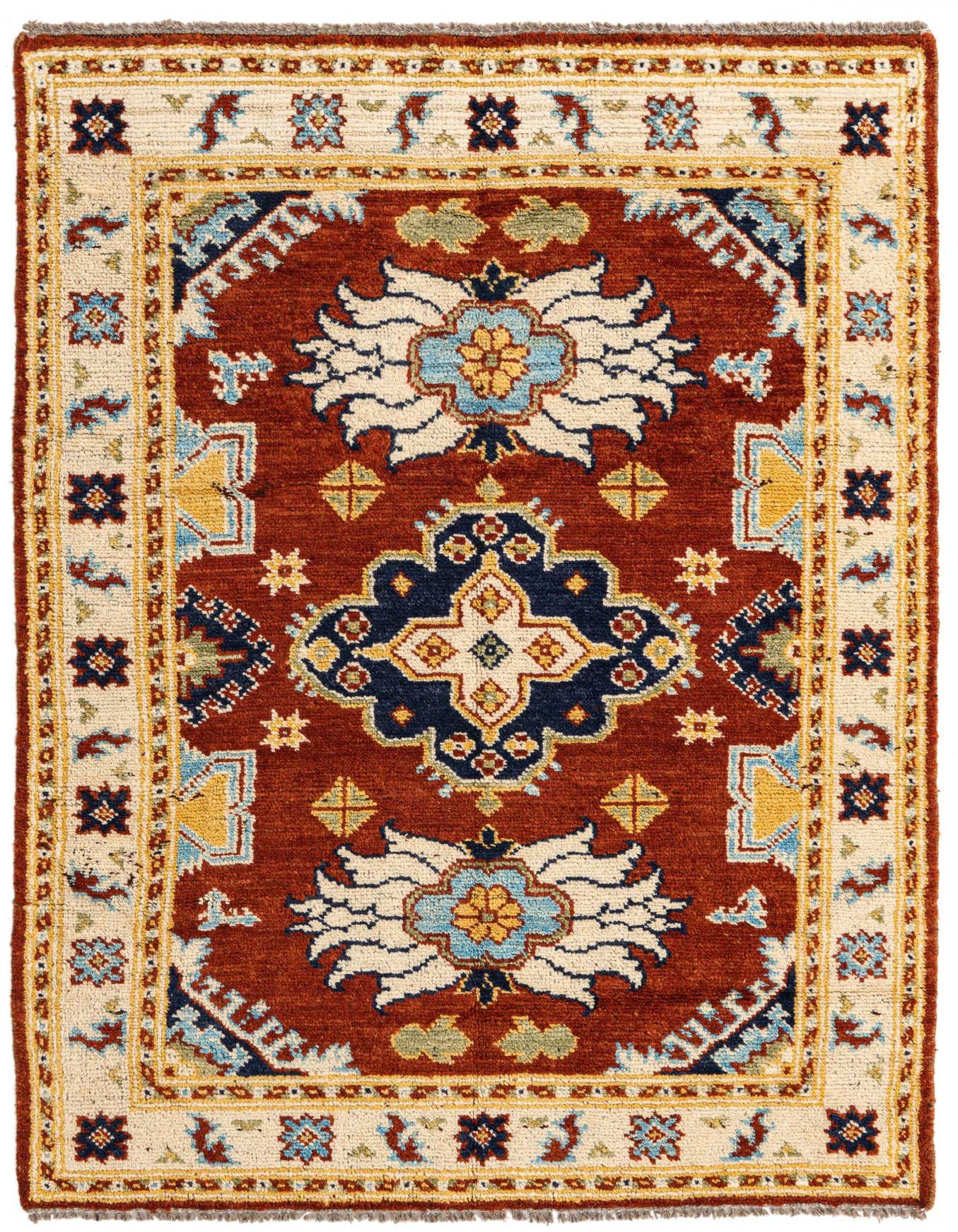 A 4x6 rectangular Rugs.com Kazak rug featuring a traditional medallion pattern in rich browns, tans, blues, and yellows.