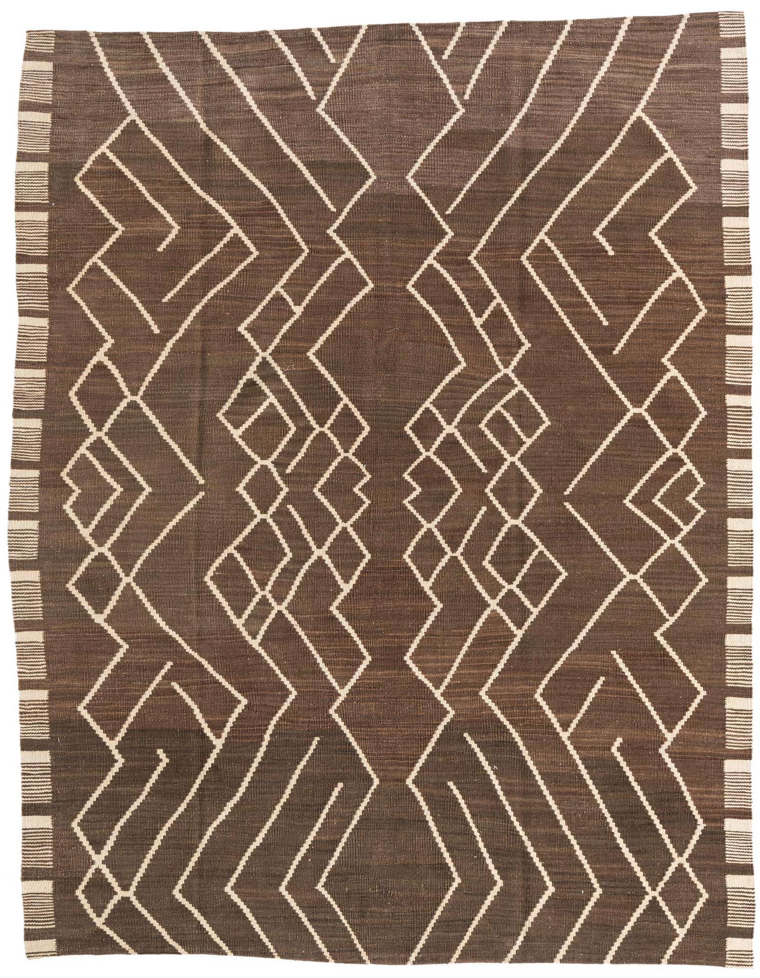 A 6x9 rectangular brown flatweave rug with a modern tribal pattern of interlocking tan geometric lines and a striped border.