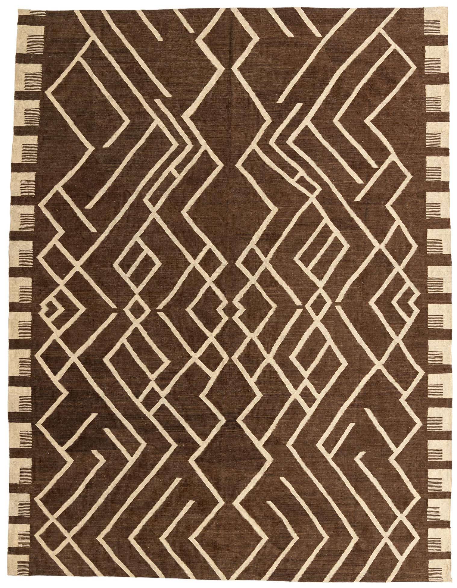 A 9x11 rectangular brown and tan wool flatweave rug with a bold tribal geometric pattern.