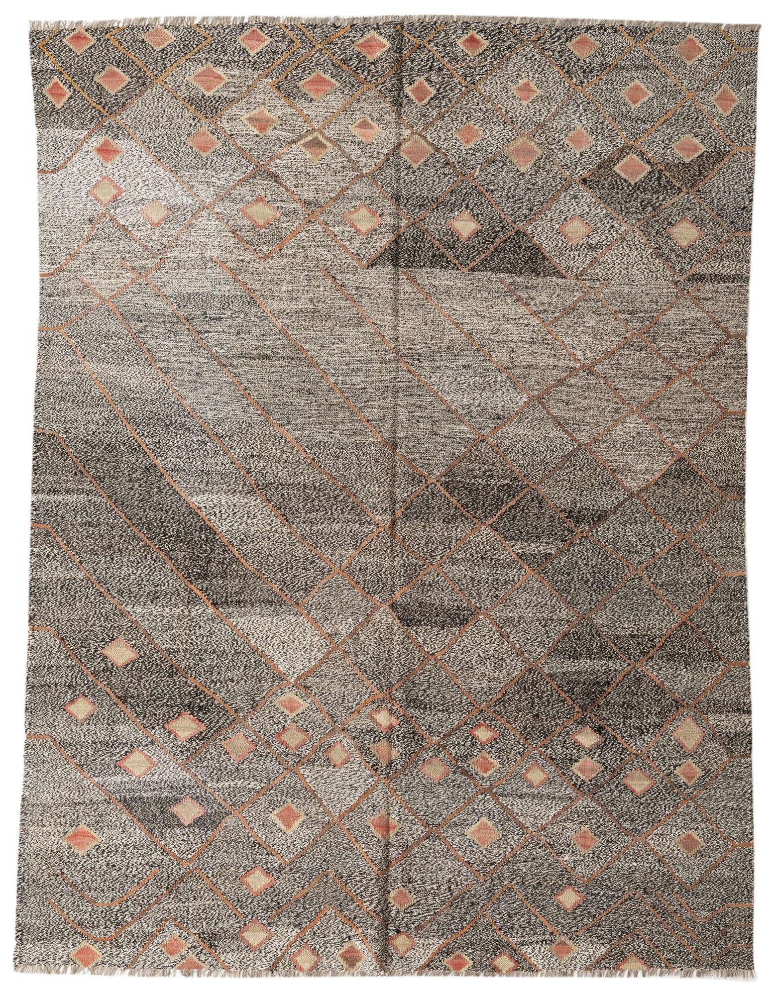 A 7x10 rectangular flatweave wool rug with a tribal modern diamond pattern in shades of brown, tan, and subtle blush.