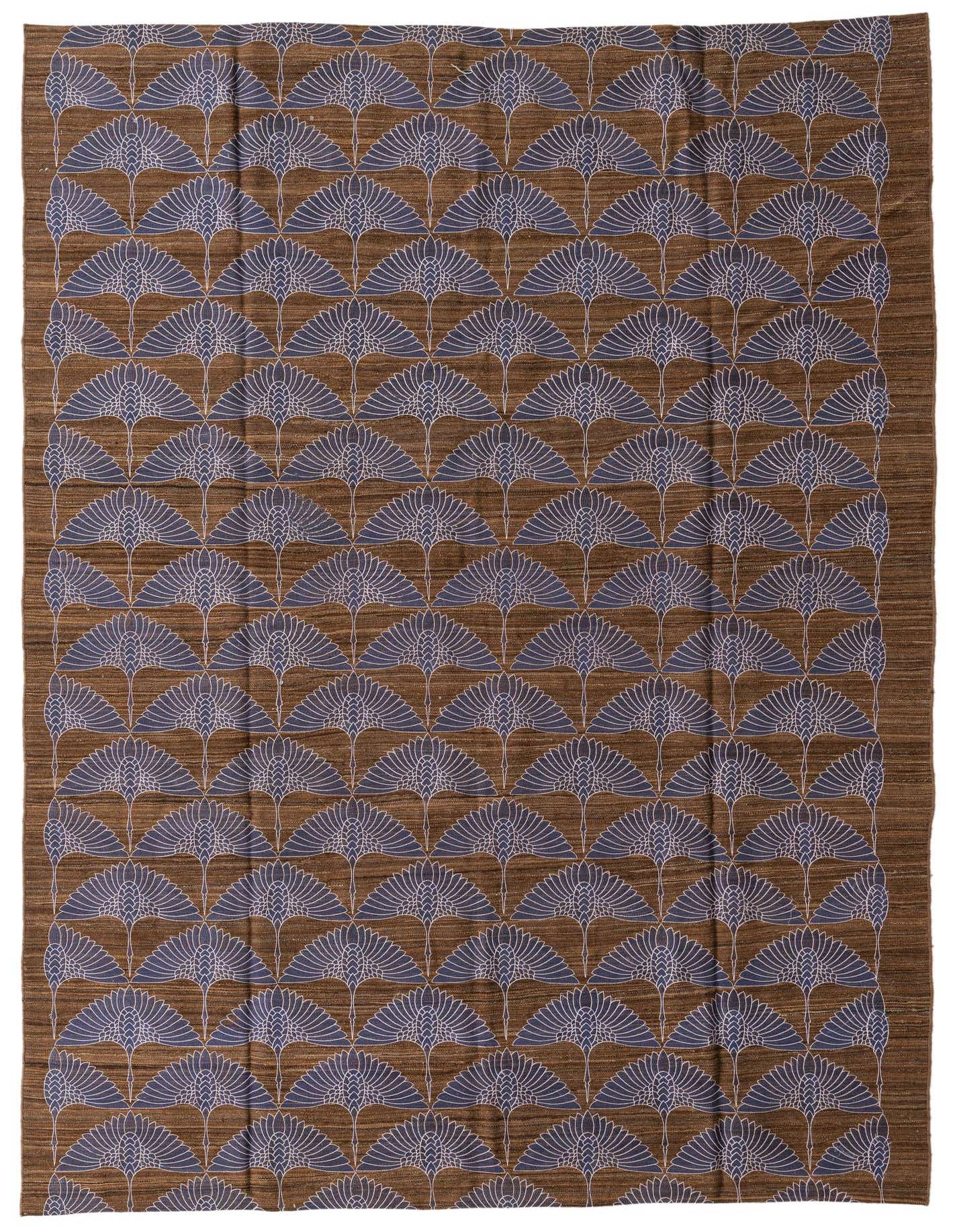 A 7x10 rectangular brown flatweave rug with a repeating pattern of stylized blue and white crane-like birds.