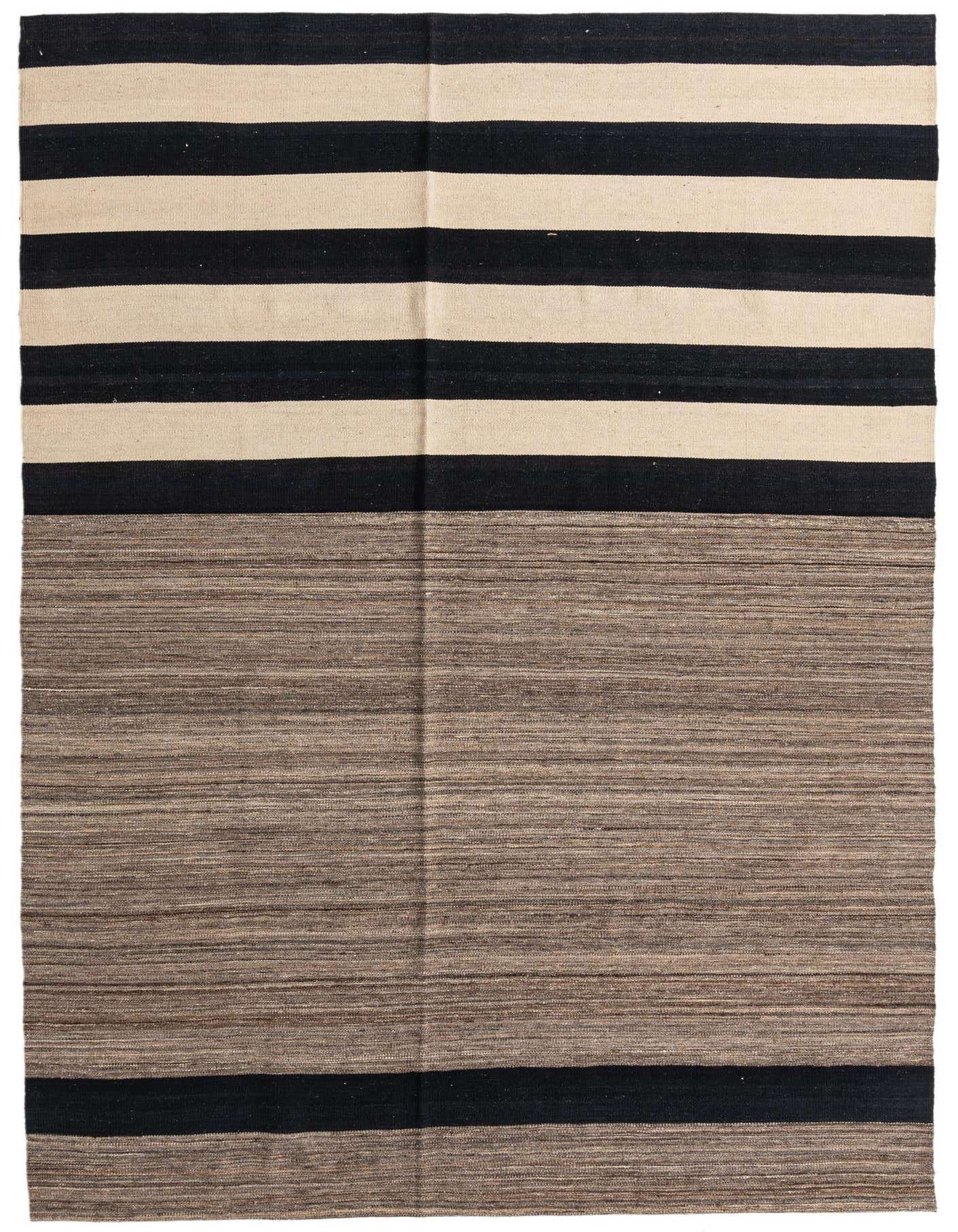 A 7x10 rectangular flatweave rug featuring bold black and cream horizontal stripes on the upper half, transitioning to a solid brown textured lower half, with a thin black stripe at the very bottom.