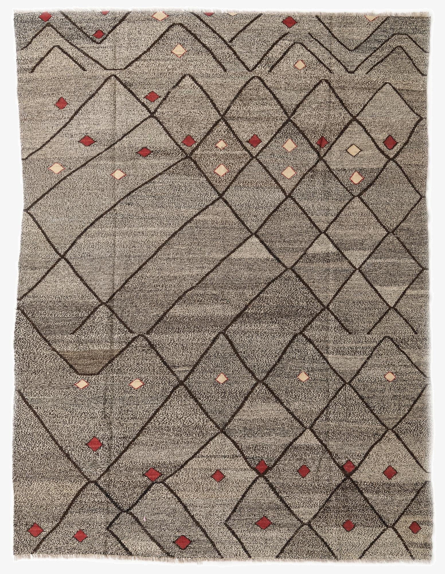 A 7x10 rectangular Kilim Modern wool rug featuring a brown tribal diamond pattern on a tan background with small red and cream accents.