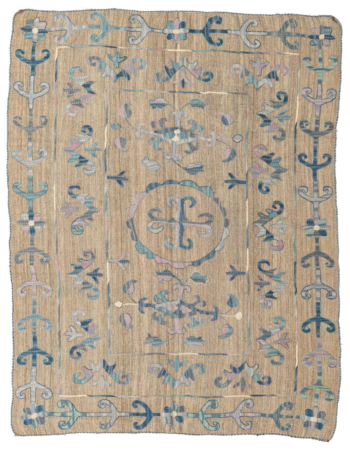 A 5x8 rectangular brown Kilim Suzani rug with a flatweave texture, featuring tribal and oriental patterns in shades of blue, teal, and subtle pink.