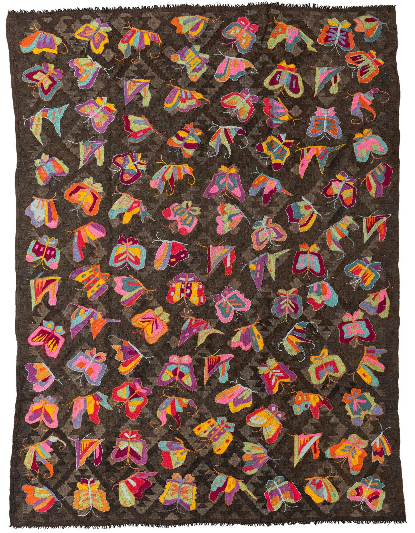 A 6x9 rectangular brown Kilim Suzani rug with a vibrant, colorful butterfly pattern, perfect for a living room.