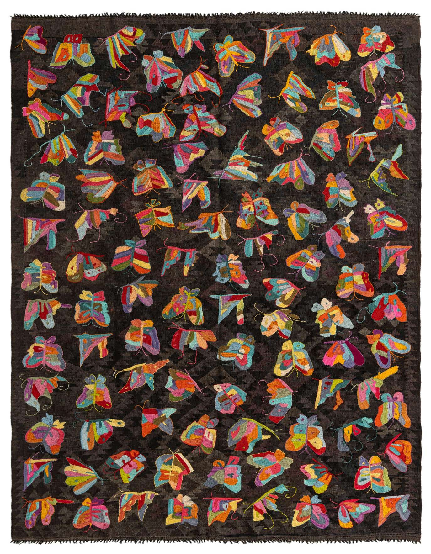 A 6x9 rectangular Kilim Suzani wool rug featuring a dark brown flatweave background with a vibrant, colorful butterfly pattern.