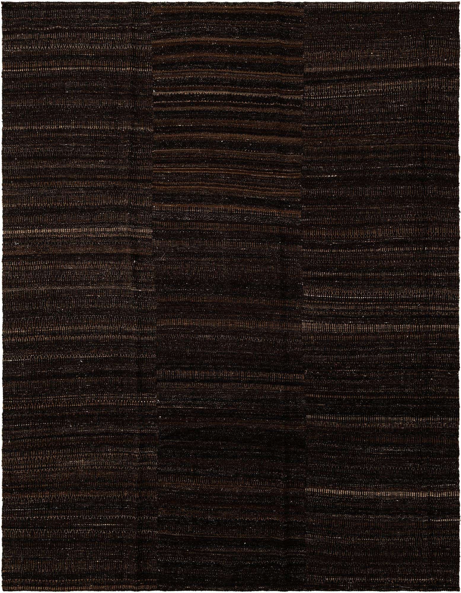 A rectangular handmade Marok Kilim rug featuring a patchwork design in varying shades of brown and tan, showcasing its flatweave texture.