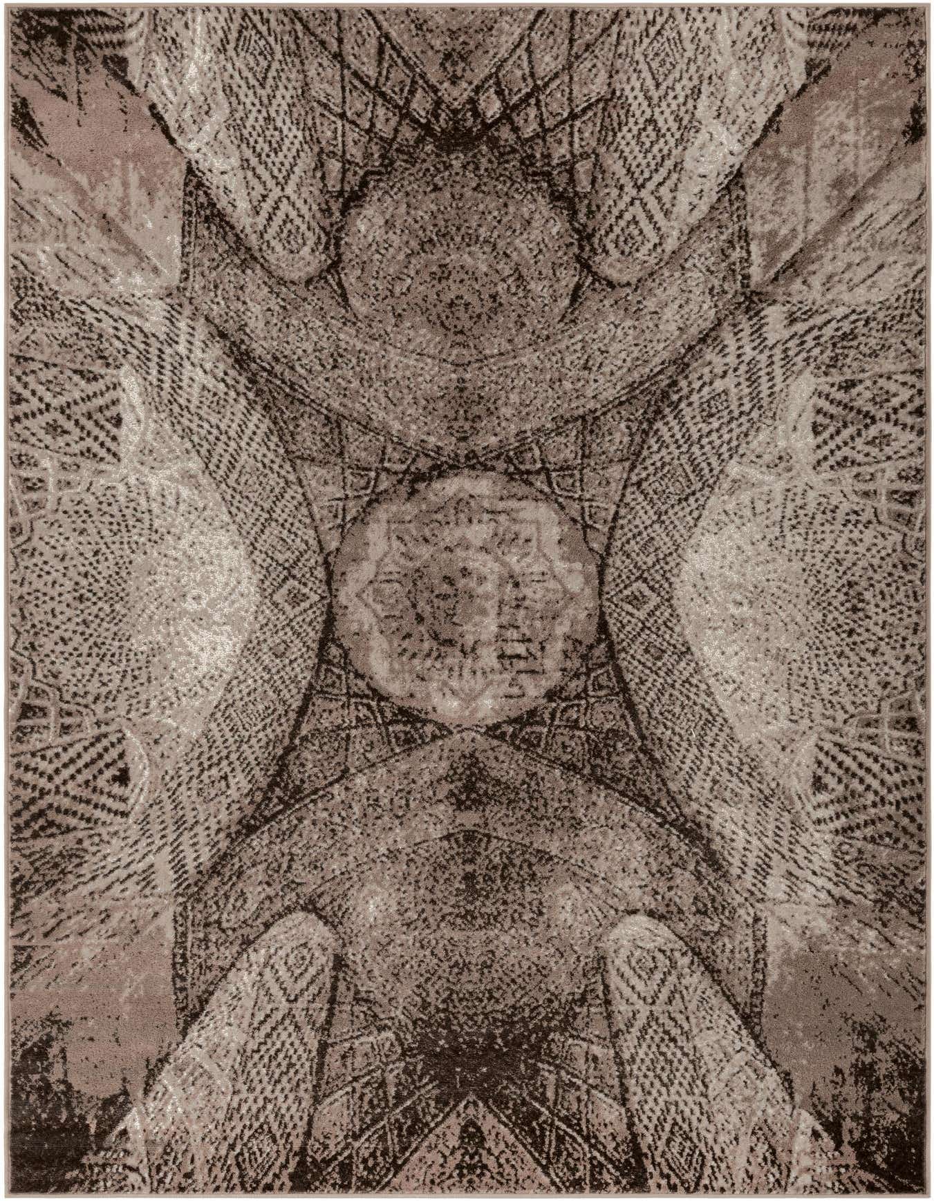 A 6x9 rectangular Monte Carlo rug featuring a distressed medallion and geometric pattern in shades of brown and tan.