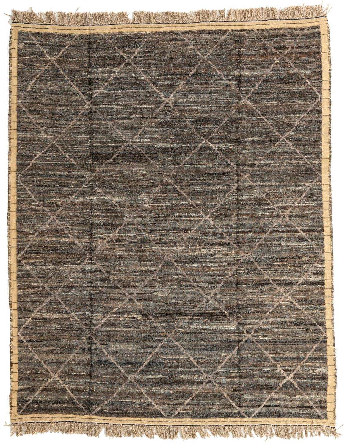 A 6x9 rectangular brown and tan Moroccan shag rug with a tribal diamond pattern and fringed edges.
