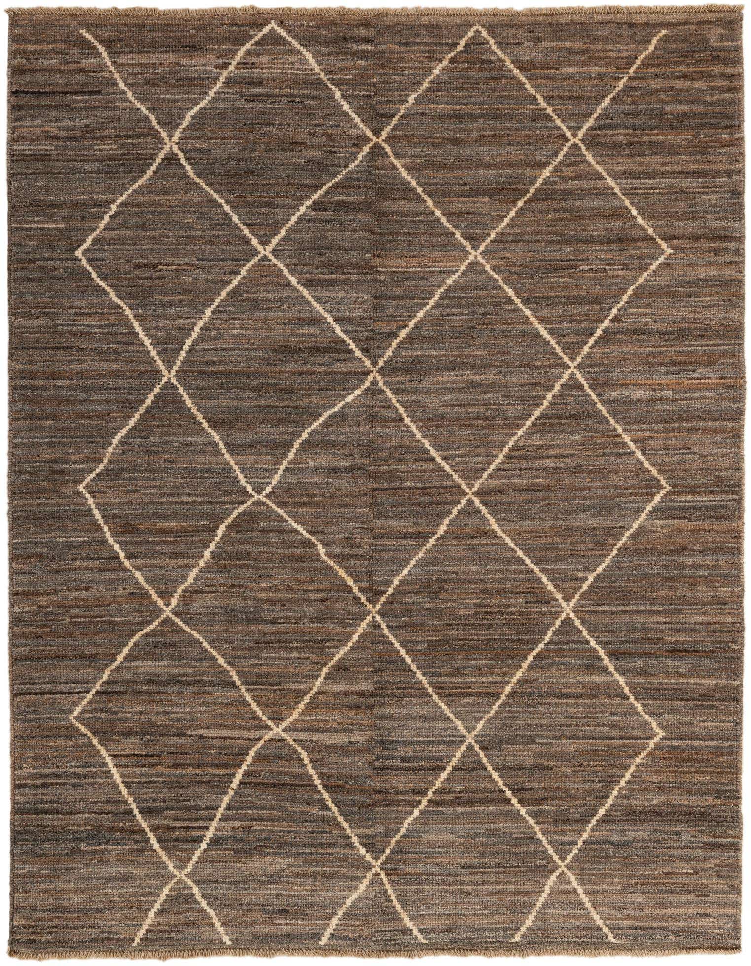 A 5x7 rectangular Moroccan rug in varying shades of brown with a cream tribal diamond pattern, made of wool.