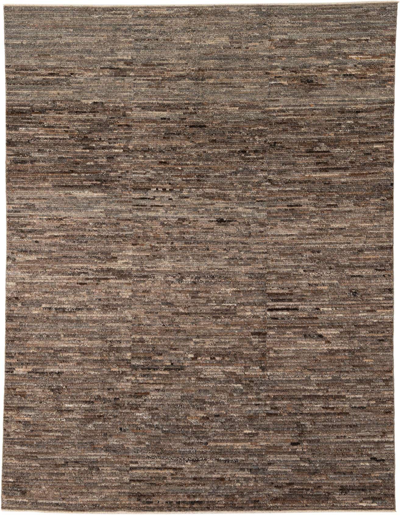 A 6x9 rectangular Moroccan tribal wool rug in varying shades of brown and tan with a textured, abstract pattern.