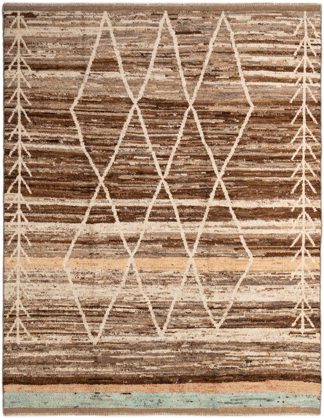 A 6x9 rectangular Moroccan tribal wool rug featuring a textured brown and tan striped background with large white diamond patterns and tree-like motifs on the sides.